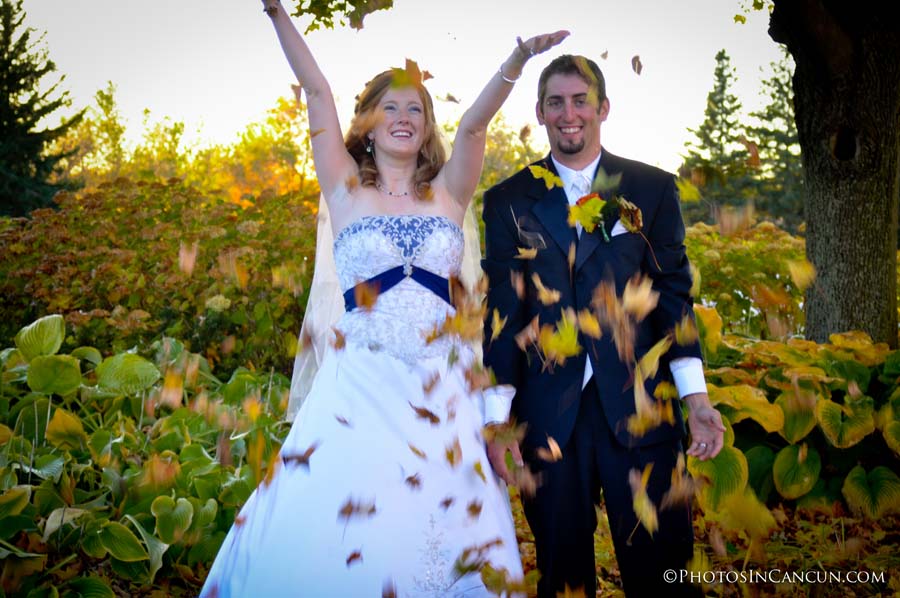Leaves are falling on a newly married couple