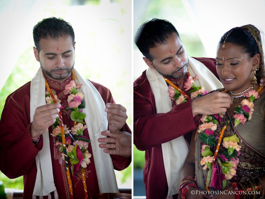 groom gives bride a necklace